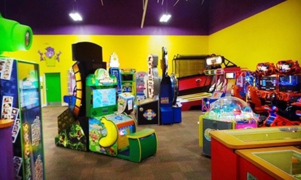 Admission for One, Two, or Four Children with Soda, Pizza, and Game Cards to Monkey Joe's (Up to 44% Off)