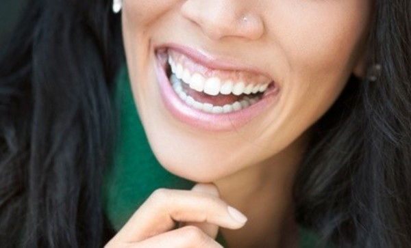 Exam, X-rays, and Cleaning, In-Home Whitening Kit, or Both at Advance Dental Cosmetics (Up to 91% Off)