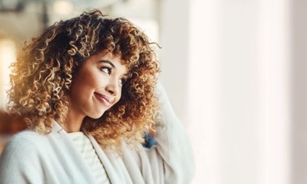 Haircut with Optional Partial or Full Highlights at Resolutions Med Spa (Up to 58% Off)