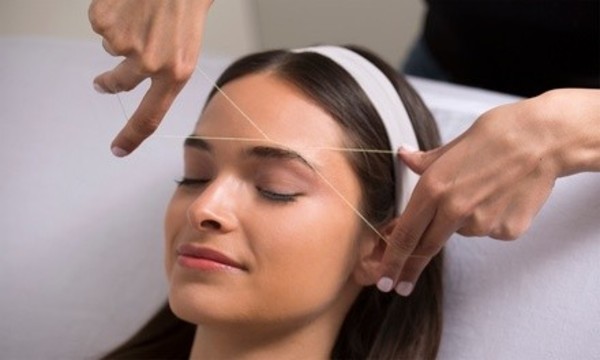 Two Eyebrow and Lip Threading Sessions or One Full-Face Threading Session at WOW Eyebrows & Spa (Up to 50% Off)