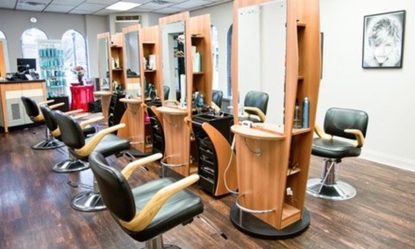 Haircut with Optional Moroccan Oil Treatment, Highlights, or Both at Toni's Salon and Spa (Up to 50% Off)