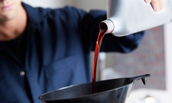 Regular or Synthetic Oil Change and Exterior Car Wash or Headlight Buffing at Gustafson Brothers (Up to 52% Off)