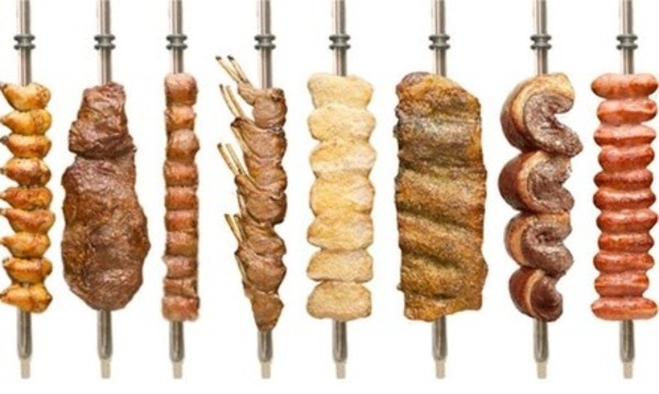 Rodizio Dinner with Bottle of House Wine for Two at Cowboy Brazilian Steakhouse (Up to 24% Off)