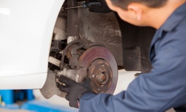 Brake Pad Replacement and Installation with One-Year Warranty at Jindal & Andre Automotive Services (28% Off)