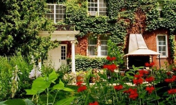 1- or 2-Night Stay for Two with Wine and History Tour and Bottle of House Wine at The Outing Lodge in Stillwater, MN