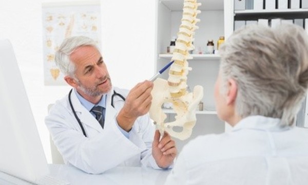 $29.50 for One Chiropractic and Wellness Package at Lexington Spinal Care ($330 Value)