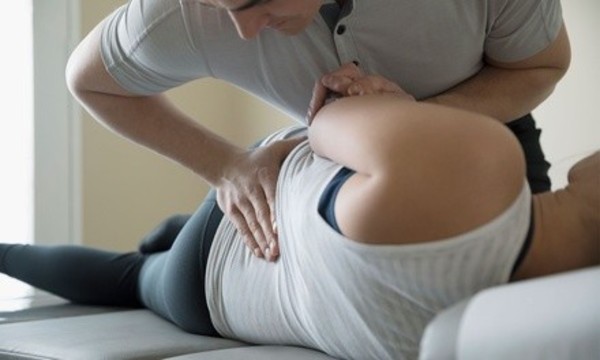 1 or 4 Chiropractic Adjustments w/ Exams, X-Ray, and Consultation at Rassel Chiropractic Center (Up to 93% Off)