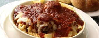 $12.81 for Toarmina or Cinnamon Bread and Three-Topping 16-Inch Pizza  ($24 Value). -Carryout Only.