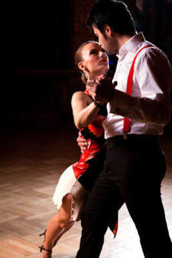 Haircut with Blow-Dry and Gloss, Root Touch-Up, or Partial Highlights at Pampered Image (Up to 30% Off)