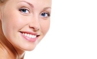 One or Two Spray-Tan Sessions, or One Body Sugar Scrub at Nirvana Spa (Up to 51% Off)