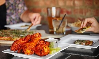 $15 for One Appetizer and One Large Pizza With Up to Three Toppings at Pizza Love ($24.98 Value)