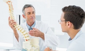 Exam, Consultation, and One or Three Adjustments with Cold Laser Therapy at Vim Chiropractic (Up to 88% Off)