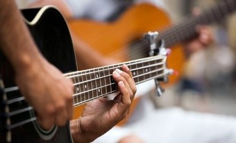 Two or Four 30-Minute Guitar or Electric-Bass Lessons at Midwest Drum and Percussion (Up to 59% Off)