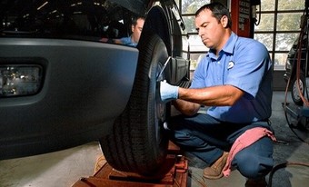 90-Point Inspection and Tire Rotation with Optional Oil Change at Sharp Automotive (Up to 55% Off)