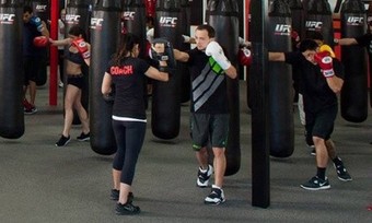Two-Week Membership or One-Month Membership with Training Session at UFC Gym (Up to 68% Off)