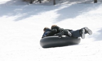 $79 for Chicago Night Snow Tubing & Brewery Bus for One from Sourced Adventures ($99 Value)