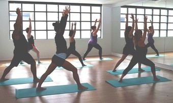 $54 for One Month of Unlimited Classes at DharmaCycle Yoga ($129 Value)