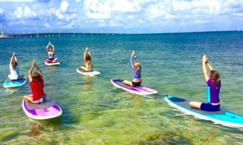 Paddleboard Yoga Therapy for One, Two, or Four at Serenity Eco Guides LLC (Up to 58% Off)