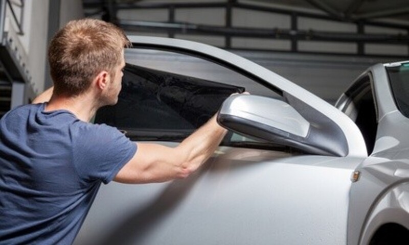 Two or Five Windows of Tint and Lifetime Warranty at CT Tint (Up to 28% Off). Three Options Available.