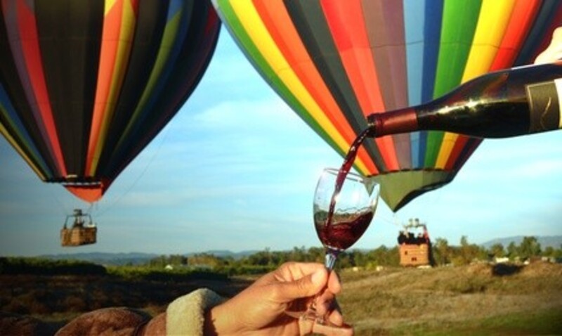 Sunrise Balloon Flight or 4-Hour Winery Tour for One or Two at Uncorked Tours (Up to 46% Off)