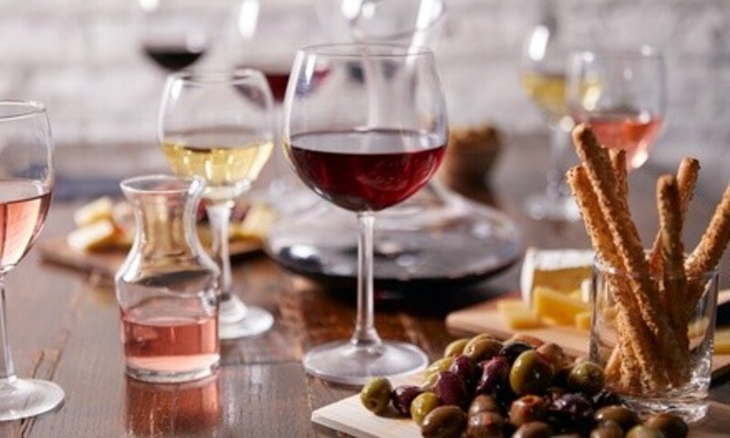 Tasting for Two or Four with Souvenir Wine Glasses at Vintner's Canton Winery (Up to 59% Off)