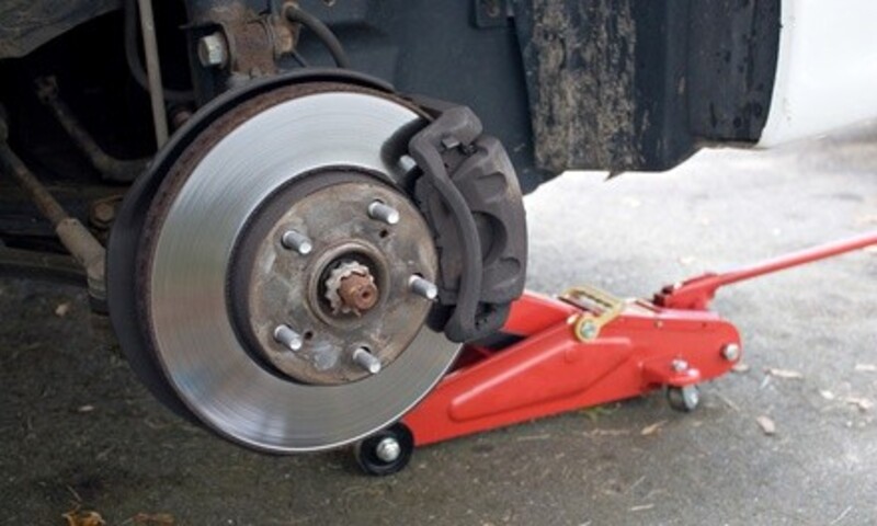 Ceramic Brake Pad Replacements with Labor at THE AUTO SERVICE (Up to 64% Off). Two Options Available.