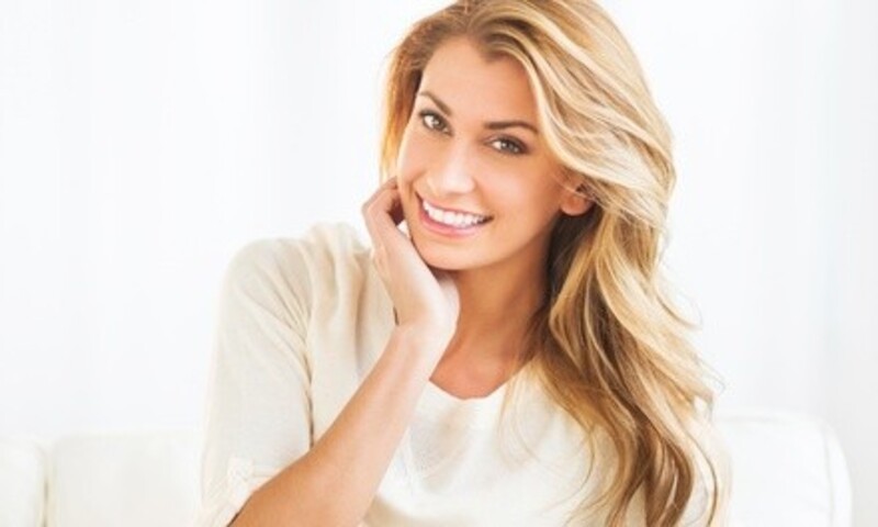 One or Two Haircuts with Highlights or $82.50 for $180 Worth of Styling Services at Karon Carlisle