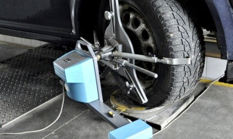 All-Wheel Alignment with Optional Tire Rotation at Inspection Express (Up to 49% Off)