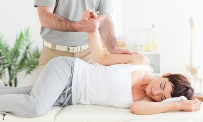 One Chiropractic Exam, X-Ray, and 60- or 90-Minute Massage at Crowne Chiropractic Clinic (Up to 84% Off)