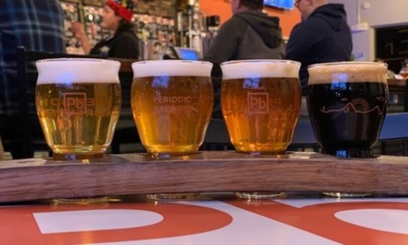 Flight of Core Beers, Bumper Sticker and Crowler Fill for One, Two, or Four at Periodic Brewing (Up to 53% Off)