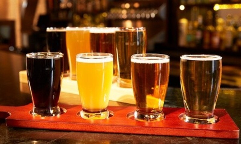 Flight of Beer and Filled 32-Ounce Growler for One, Two, Three, or Four at Tiger Town Brewery (Up to 48% Off)