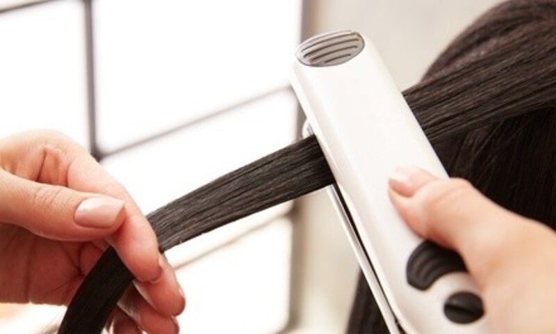 One or Two Silk Presses with Conditioning and Trim at Changing Looks (Up to 66% Off) 