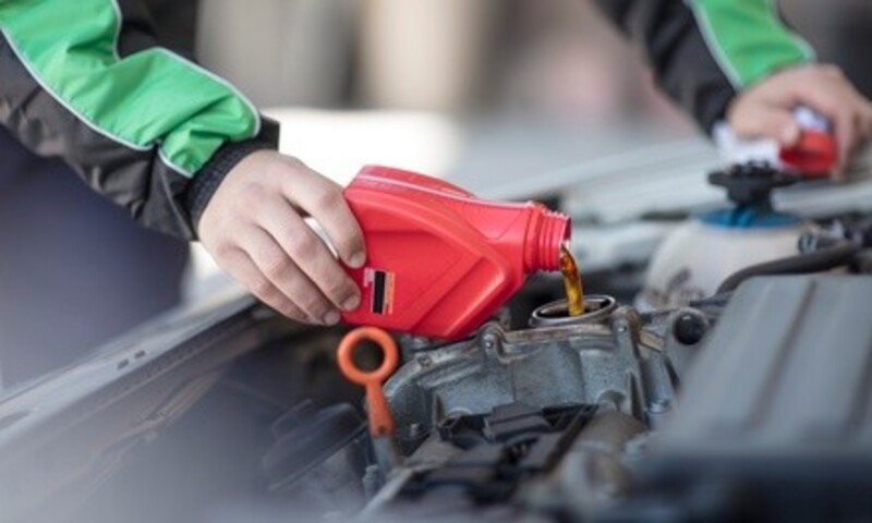 Semi- or Full-Synthetic Oil Change Package with Optional Tire Rotation at 2 Quick Automotive (Up to 60% Off)