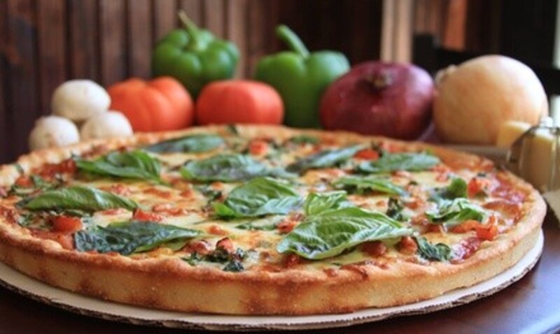 Takeout Family Combo Package or Two Medium Two-Topping Pizzas at Papa Ray's Pizza & Wings (Up to 41% Off)