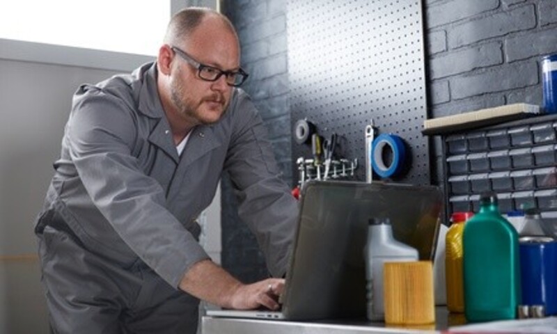 Full- or Semi-Synthetic Oil Change with 15-Point Inspection at OK Magic Car Wash (Up to 35% Off)