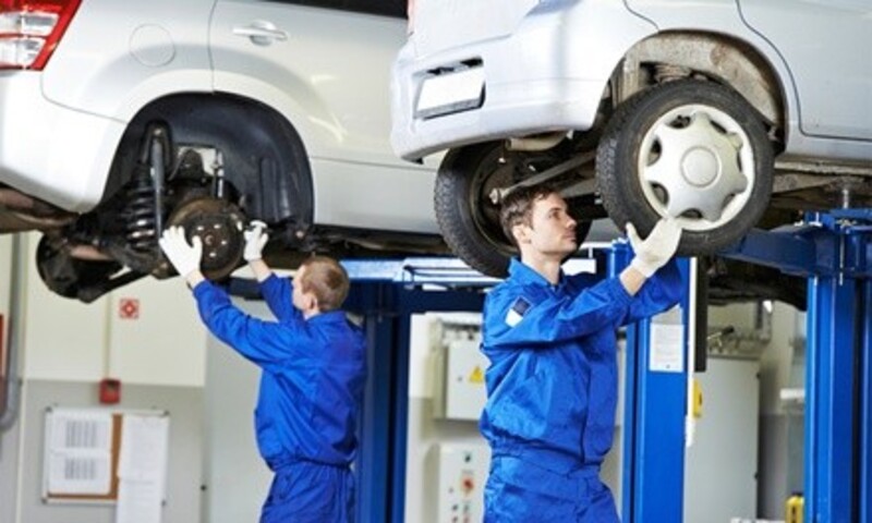 Oil Change Package, AC Recharge, or Six-Month All-Wheel Alignment Service at Sun City Exxon (Up to 66% Off)