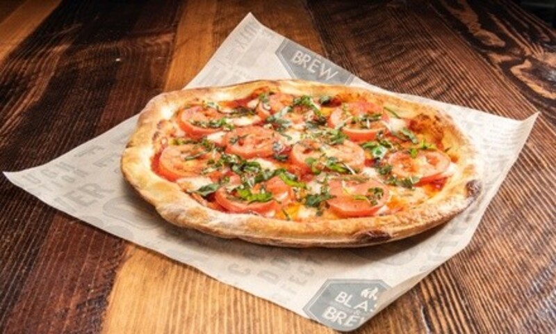 One, Three, or Four Signature or BYO Pizzas with Up to Three Toppings at Blast and Brew (Up to 30% Off)