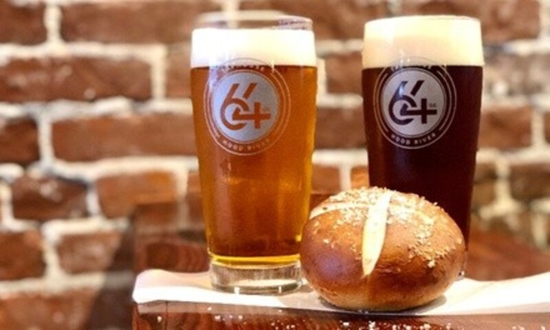 $9 for Two Pints of Beer and One Gourmet Pretzel Roll for Two People at 64oz. Taphouse ($18 Value)