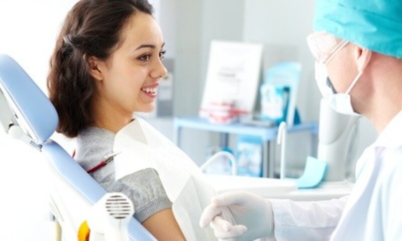 Dental Exam, Cleaning, X-Rays with Optional Invisalign Consultation at Grand Dental Spa (Up to 89% Off)