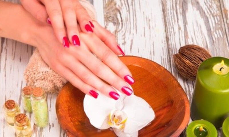 One Dipping Powder, Gel, Shellac, or Deluxe Manicure or Deluxe Pedicure at Nails & Spa (Up to 31% Off)