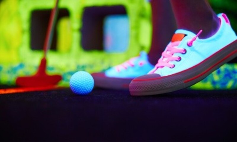 Glow-in-the-Dark Mini-Golf for Two, Four, or Six at Glow Golf (Up to 55% Off). Four Options Available.