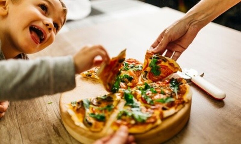 Family Meal Package or $8 for $10 Worth of Food and Drink at Prima Pizza Bronx