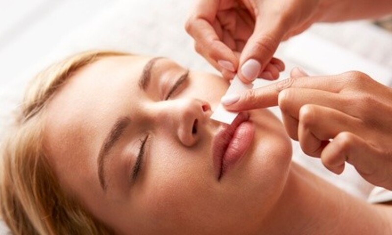 One Lip and Chin Wax or One Eyebrow Wax, or both at Modest Touch (Up to 40% Off)