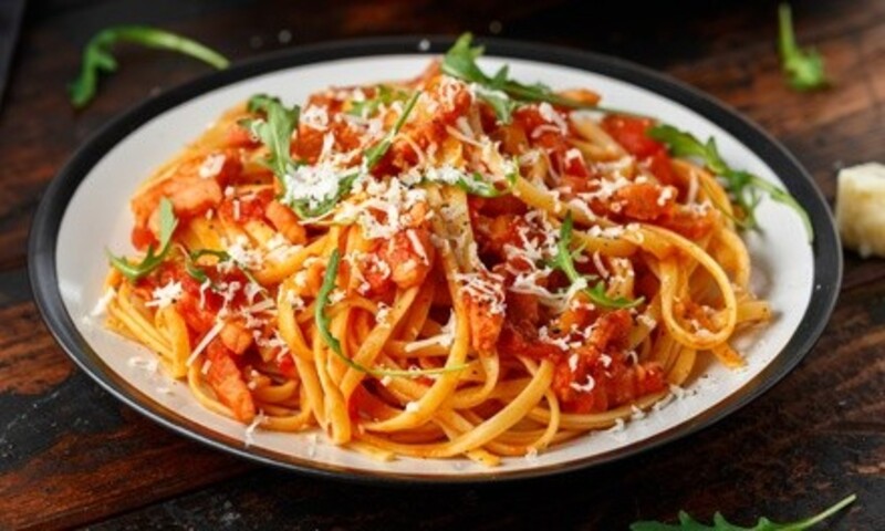 Two or Four Pastas Any Kind and Garlic Bread Appetizers at J. Fleming's Absolutely Delicious (Up to 24% Off)