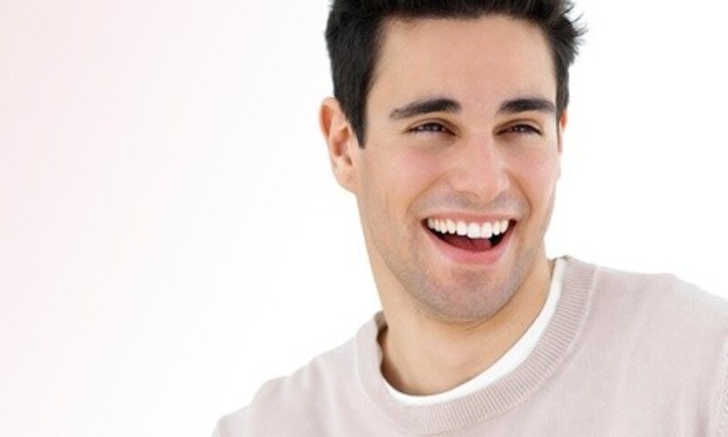 One, Two, or Three Dental Implants with Abutments and Crowns at Elite Dental Care (Up to 70% Off) 