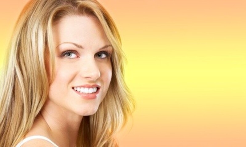 One or Two Dental Implants with Abutments and Crowns at Dental2000 (Up to 58% Off)