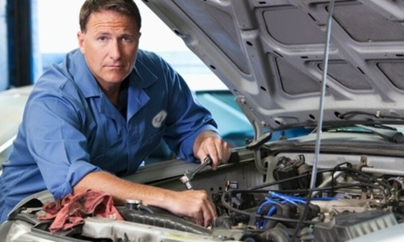Complete Vehicle Inspection with Tire Rotation or with Check Engine Light at Midas (Up to 80% Off)