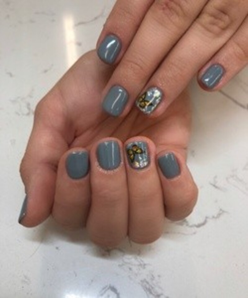 One Gel Manicure or Pedicure or One Package with Basic Manicure and Pedicure at Exclusive Spa (Up to 47% Off)