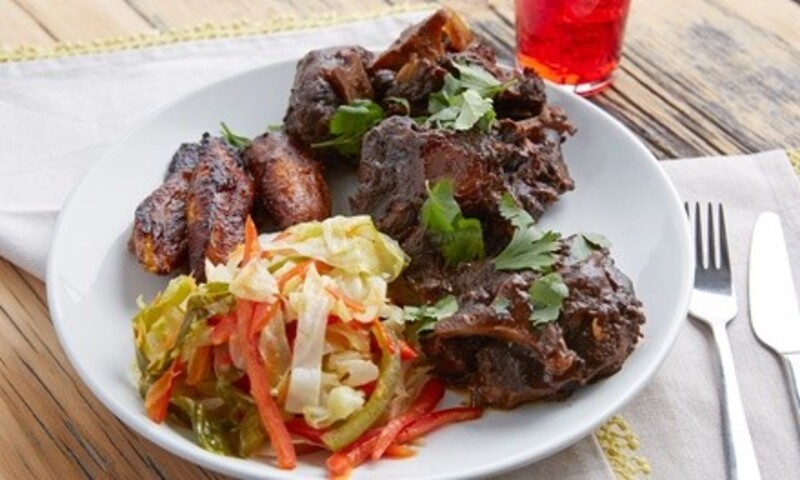 $21 for $30 Worth of Food and Drink at Queen Of The Tropics Restaurant, Takeout and Dine-In