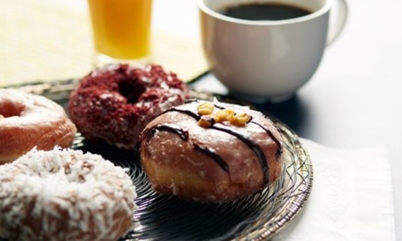 Food & Drink or Dozen Donuts for Carryout & Dine-In at Delfina's Sweets (Up to 40% Off). Five Options Available.